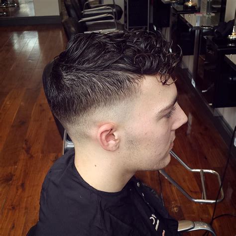 Faux hawk fade haircuts are hands down the edgiest and most stylish hairstyles for men with a the skin fade starts low enough to create a stylish disconnect between the beard and the hair. 26+ Low Skin Fade Haircut Ideas, Designs | Hairstyles ...