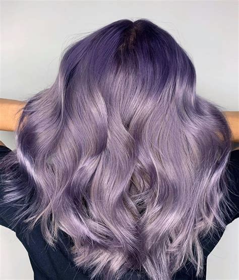 25 Lavender Hair Looks To Consider For Your Next Dye Job Light Purple Hair Faded Hair Color