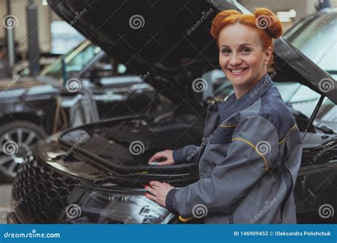 Female Mechanic Working At Car Service Station Stock Photo Image Of