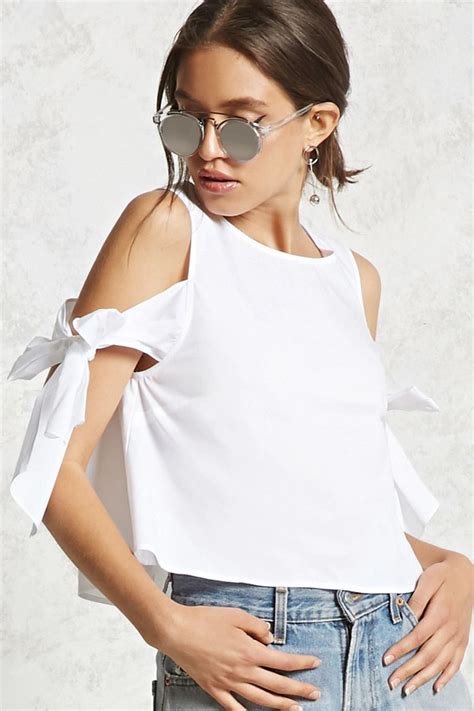 Forever Contemporary A Woven Poplin Top Featuring An Open Shoulder