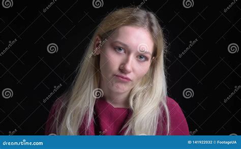 Closeup Shoot Of Young Pretty Caucasian Female With Blonde Hair Being