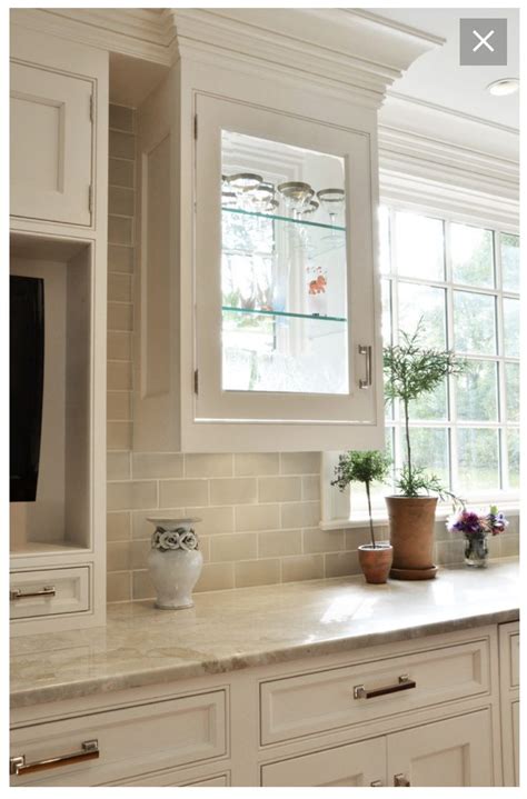If you have elected for matte finish cabinets you may lean. Love the combination of backsplash and soprano countertop ...