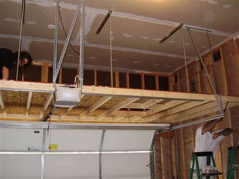 Create a sliding overhead storage system. Overhead Garage Storage: Smart Solution to Build ...
