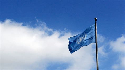 United Nations Emblem And Flag United Nations