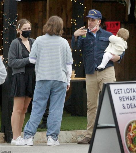 Hunter Biden Carries Nine Month Old Son Beau On His Hip In LA Daily