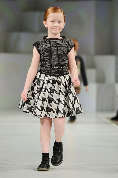 A Model Wearing Roksanda Ilincic Look 15 Autumnwinter 13 Walks The Runway At The Global Kids