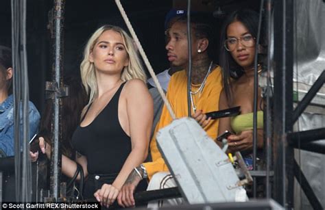 Busty Blonde Flirts And Caresses Tygas Hand At Wireless Daily Mail