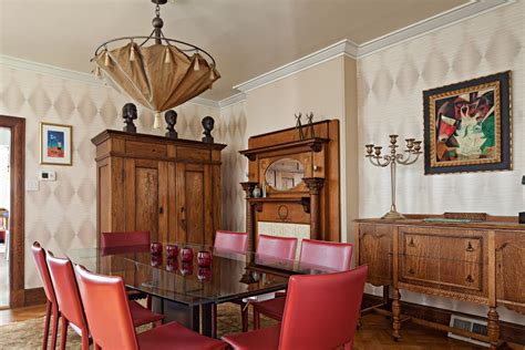 If traditional hutch cabinets aren't really your style, check out this sleek storage unit. Eclectic Dining Room With Craftsman Armoire and Buffet | HGTV