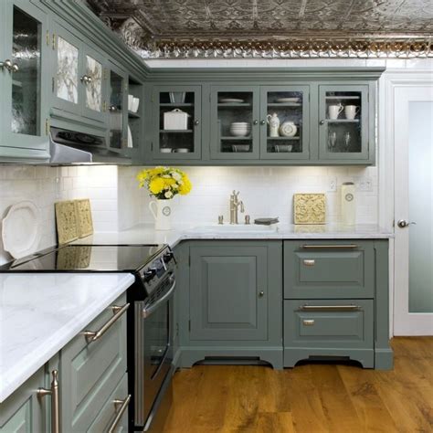 Having empty drawers and cabinets ensures you do not get cleaner, primer or paint on items you use when preparing food. [paint laminate kitchen cabinets brand type types painting from Best Type Of Paint For Kitchen ...