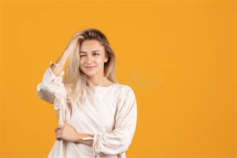 Close Up Portrait Of Young Bautiful Caucasian Girl Isolated Over Red