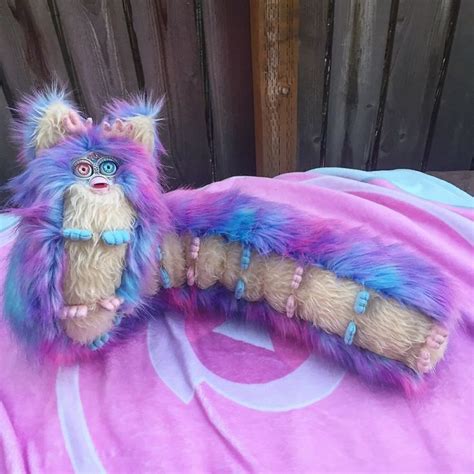 People Online Are Turning Their Furbies Into Centipedes And They Look