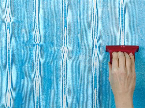After you've cut in your edges at the ceiling and baseboard using a brush, use your roller to apply paint from the ceiling downward. Creative Ways to Liven Up Walls with Paint