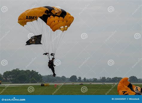 Parachuting Us Soldier With Usa Flag Against A Clear Blue Sky Editorial