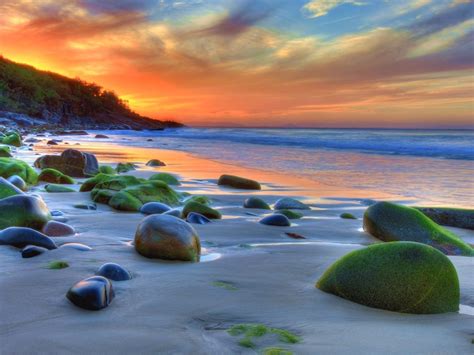 Enjoy and share your favorite beautiful hd wallpapers and background images. Sunset Ocean Sandy Beach Rocks Green Movi Water Nature 4k Wallpaper For Desktop Mobile Phones ...