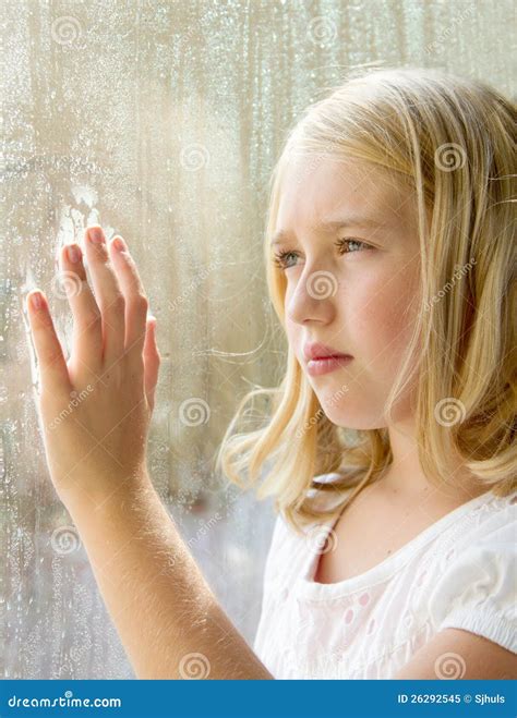 Teen Or Child Looking Out A Window Royalty Free Stock Photo Image