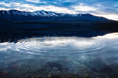 Ripple was originally founded by a single company, ripple labs, and continues to be backed by it, rather than the larger network of developers that continue bitcoin's development. Image result for still lake ripples