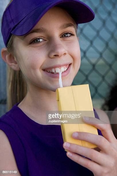 Girl Drinking Juice Box Photos And Premium High Res Pictures Getty Images