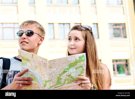 Couple Tourists With Map Stock Photo Alamy
