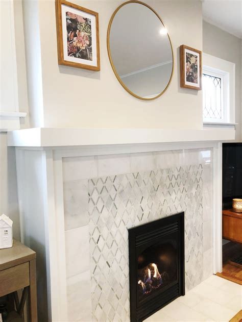White Geometric Pattern Marble Tile Fireplace Update With Gold Mirror