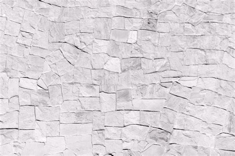 Surface White Wall Of Stone White Stone Wall Background Stock Photo
