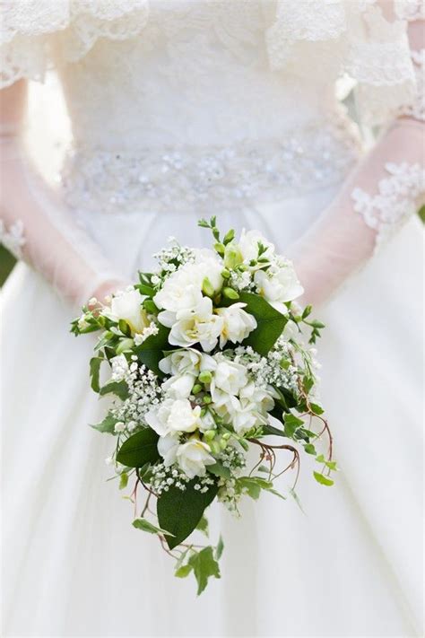A Chic And Classic Parisian Inspired Wedding Cascading Wedding Bouquets