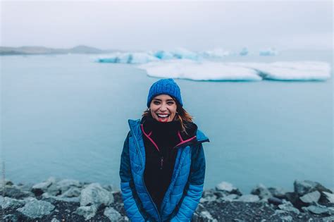 Portrait Of A Woman At The Beautiful Blue Glacier Lagoon In Iceland