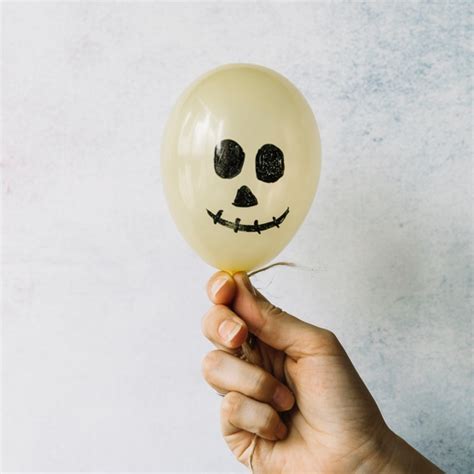 Free Photo Halloween Balloon With Scary Painted Face