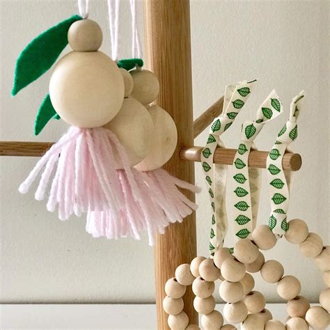 Wooden Bead Christmas decorations | Beaded christmas decorations, Christmas decorations, Wooden ...