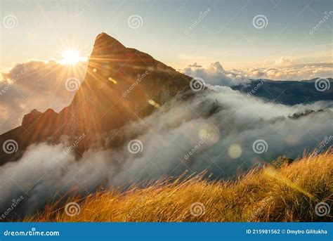 Munnar Mountain Landscape With Flowing Fog And Clouds At Sunrise Stock