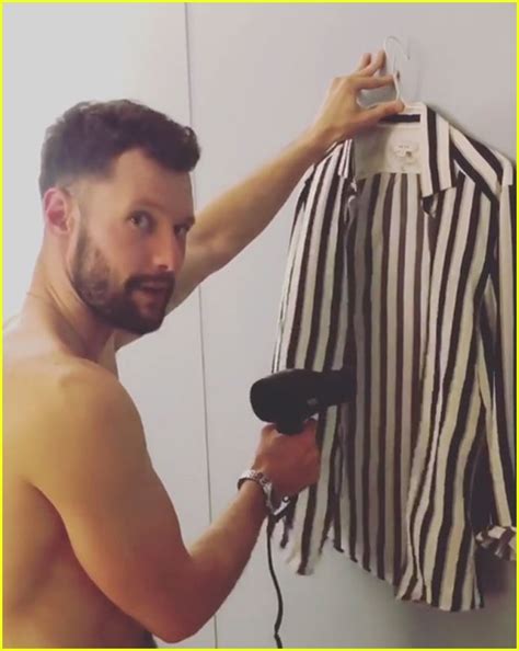 Calum Scott Goes Shirtless While Drying His Shirt On Tour Photo