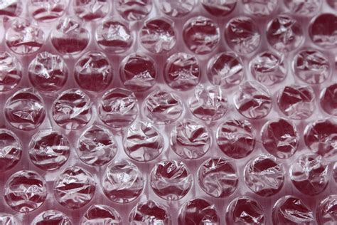 Bubble Wrap On The Red Background Free Photo Download Freeimages