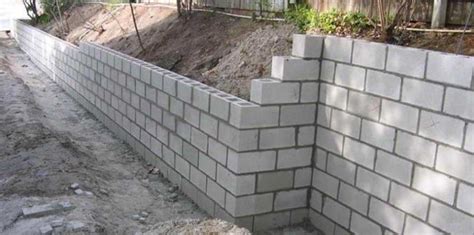 Reinforced concrete block retaining walls are a convenient way of building vertical retaining walls. Construction of Concrete Block Retaining Walls with Steps