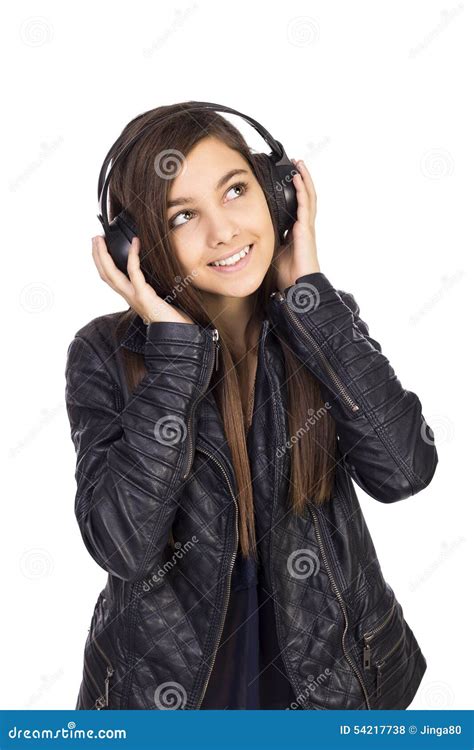 Pretty Teenage Girl Listening Music On Her Headphones Stock Photo