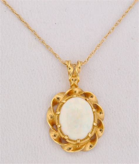 Amazon Com 14K Yellow Gold Opal Pendant Pendant Necklaces Clothing