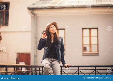 Pretty Girl Sitting On The Railing Stock Image Image Of Enjoy Look
