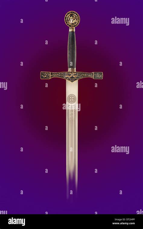 Fine Specimen Of A Medieval Sword Against Colored Background Stock