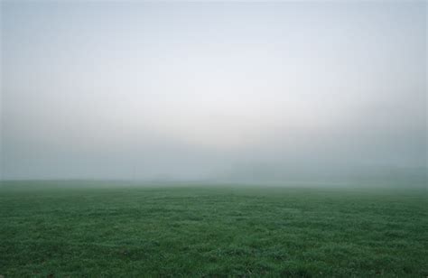 Free Photo Green Grass Field Under White And Gray Sky