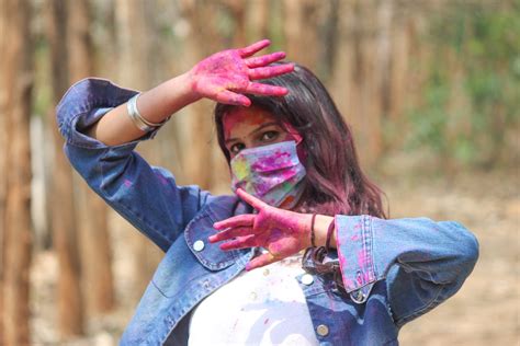 A Girl With Face Mask Celebrating Holi Festival Pixahive