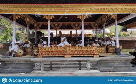 Traditional Balinese Musicians Playing At Music Instrument Gamelan