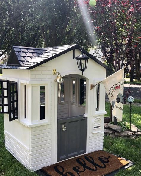 For more playhouse decorating and accessory ideas, keep up with us on instagram. DIY Plastic Painted Playhouse | Play houses, Backyard play, Backyard for kids