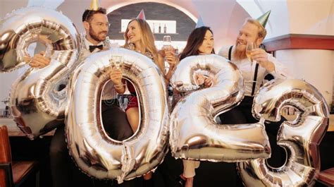 Party People Women And Men Celebrating New Years Eve 2023 Stock Photo