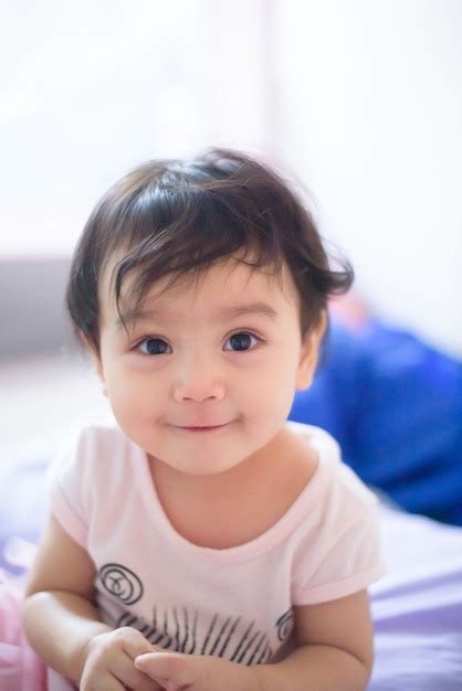 Premium Photo Portrait Of A Cute Happy Little Asian Baby Girl She Sit