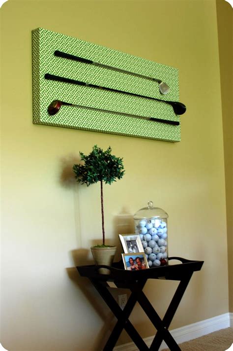 I featured my brother's trophy from when he was a kid, a vintage bank shaped like a golf ball, golf. 33 Shades of Green: Golf Club Wall Decor