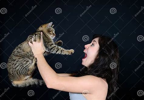 The Girl Screams At The Cat In The Studio Stock Image Image Of