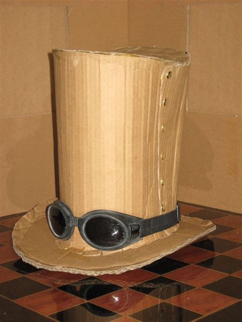 Cut out two strips of plain white paper 1 inch wide by 11 inches long. how to make a top hat out of tin can | Cardboard Top Hat ...