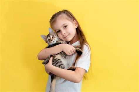 Girl Holding Cat Images Free Download On Freepik