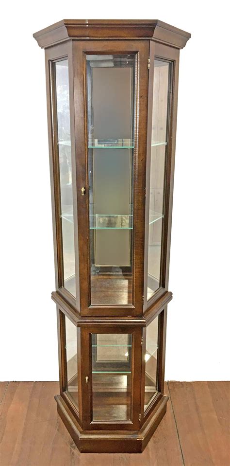 Howard miller curio display cabinets for collection in traditional display cabinets on oak finish display cabinets,traditional display cabinets,680341,curio cabinets,curio cabinet,china cabinet. Lot - Traditional Style Illuminated Curio Cabinet