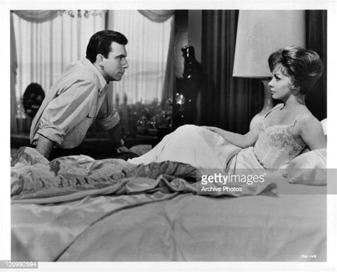 Anthony Franciosa Sitting On Bed Talking With Gina Lollobrigida In A