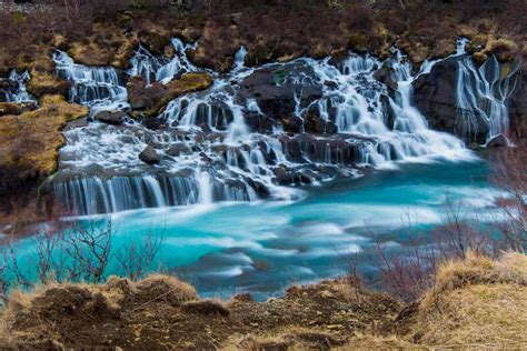 Unveiling Hraunfossar And Barnafoss Waterfalls Icelands Spectacular Duo