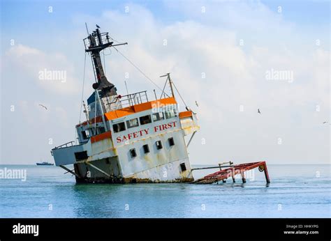 Shipwreck Sinking Cargo Ship In The Middle Of The Sea Stock Photo Alamy
